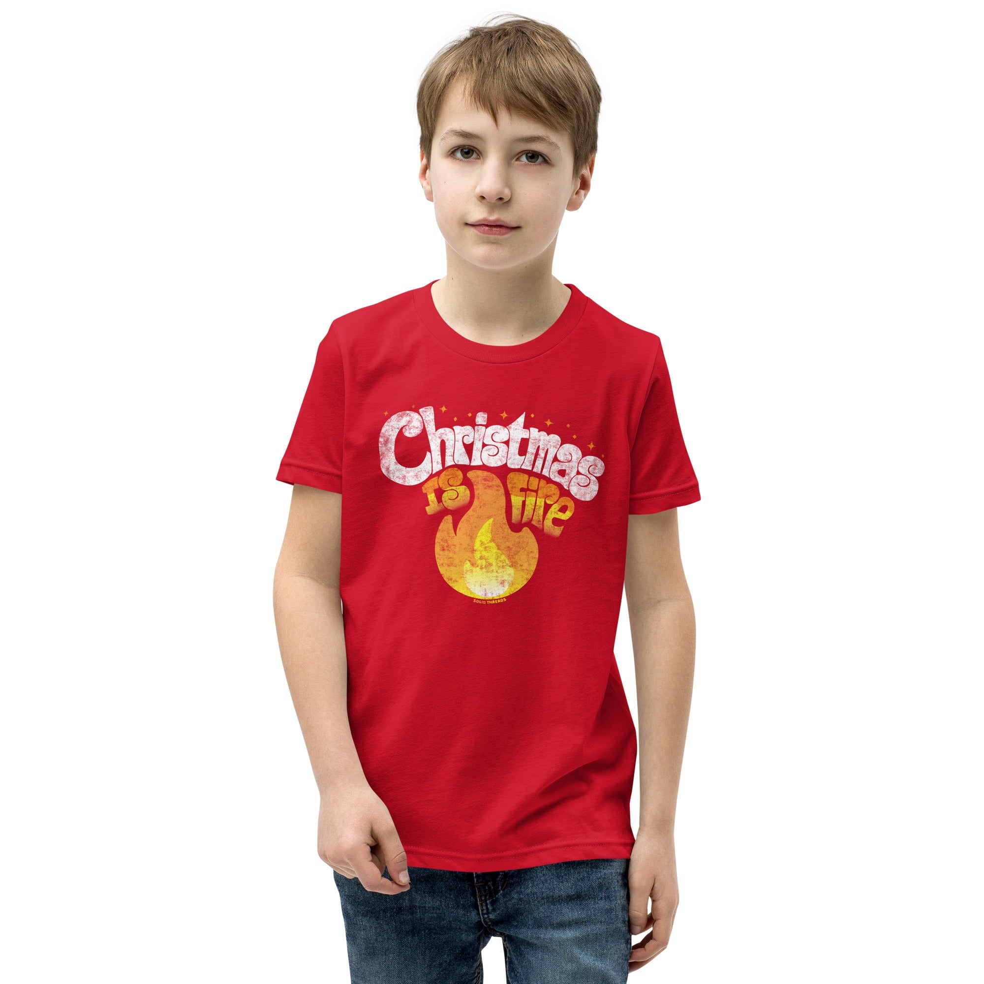 Youth Christmas Is Fire Retro Extra Soft T-Shirt | Funny Holiday Kids Tee Boy Model | Solid Threads
