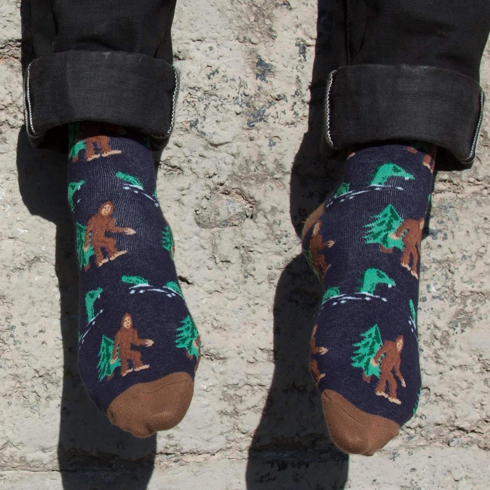 Bigfoot & Nessie Funny Woven Socks | Cool Sasquatch Cryptid Graphic Socks on Model | Solid Threads