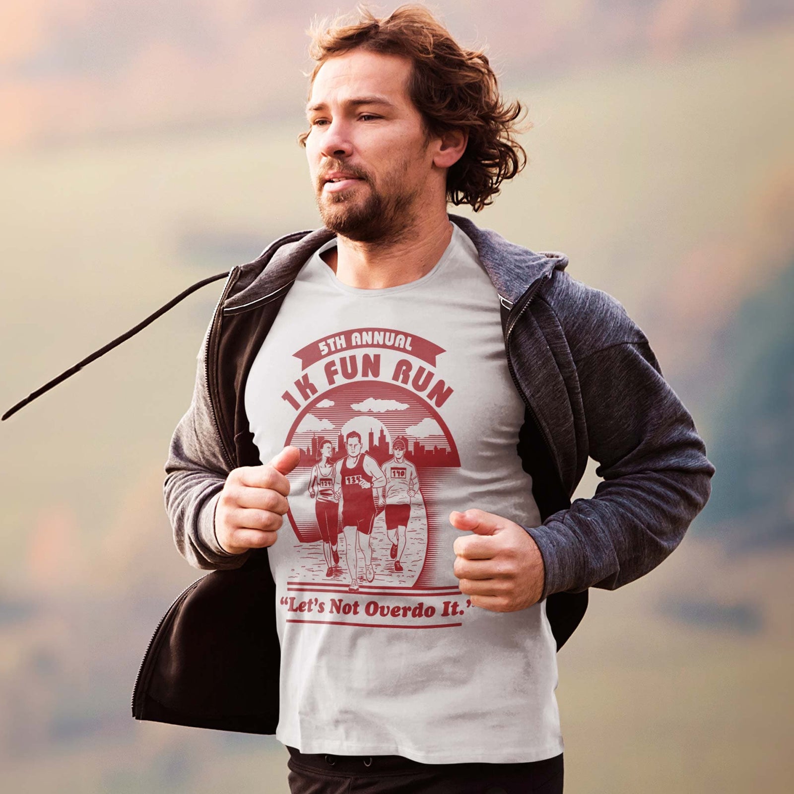 Men's 1K Fun Run Funny Lazy Athlete Graphic T-Shirt | Vintage Marathon Parody Tee On Model | Solid Threads