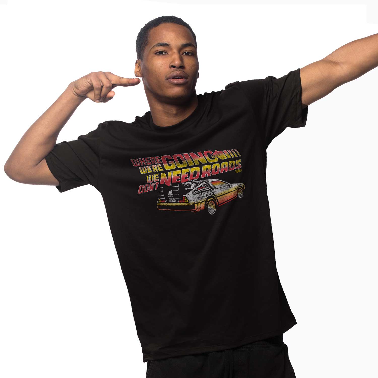 Cool Men's We Don't Need Roads Vintage 80s Back To The Future Graphic Tee on Model | Solid Threads