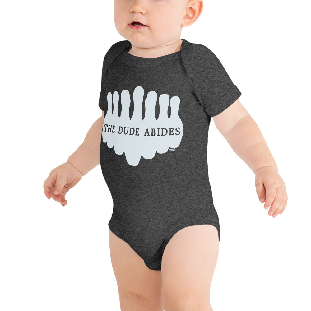 Baby Dude Abides Cool 90s Extra Soft One Piece | Funny Big Lebowski Romper On Model | Solid Threads