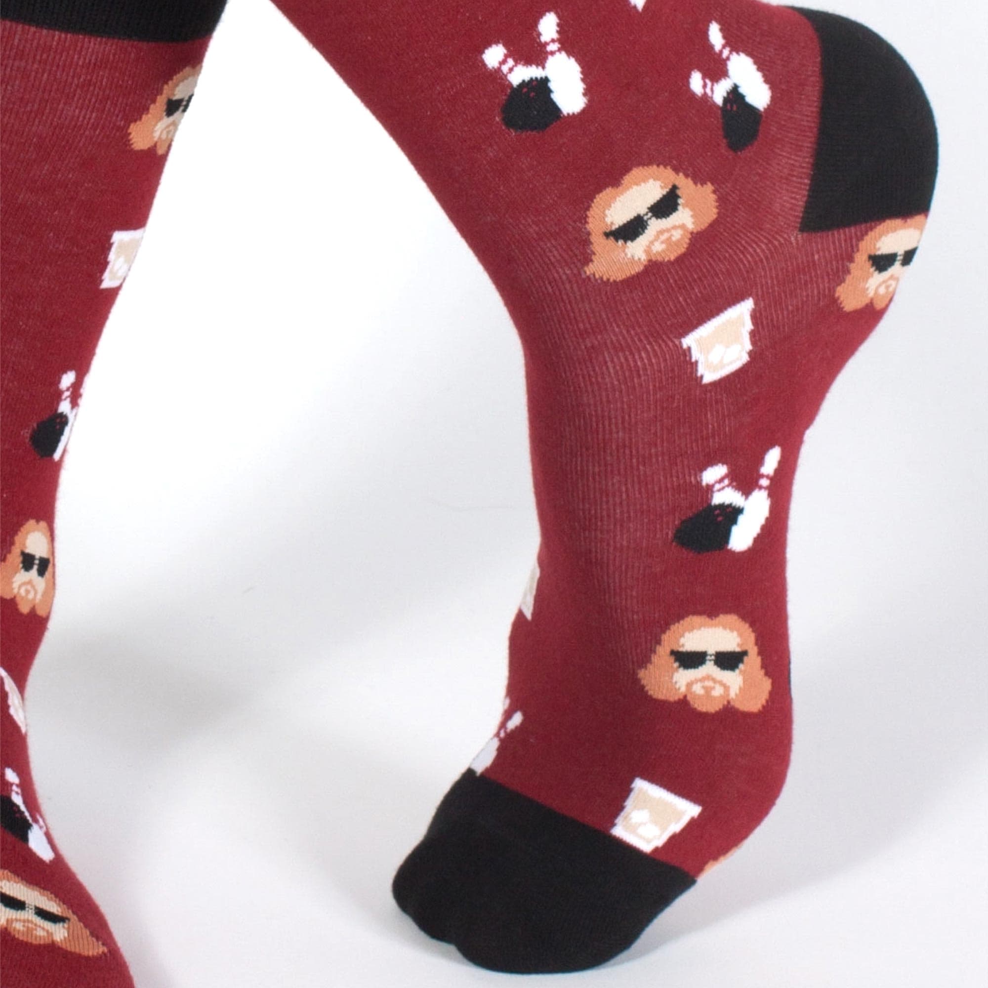 Abide Funny Woven Socks | Designer Dude Movie Bowling Graphic Socks on Model | Solid Threads