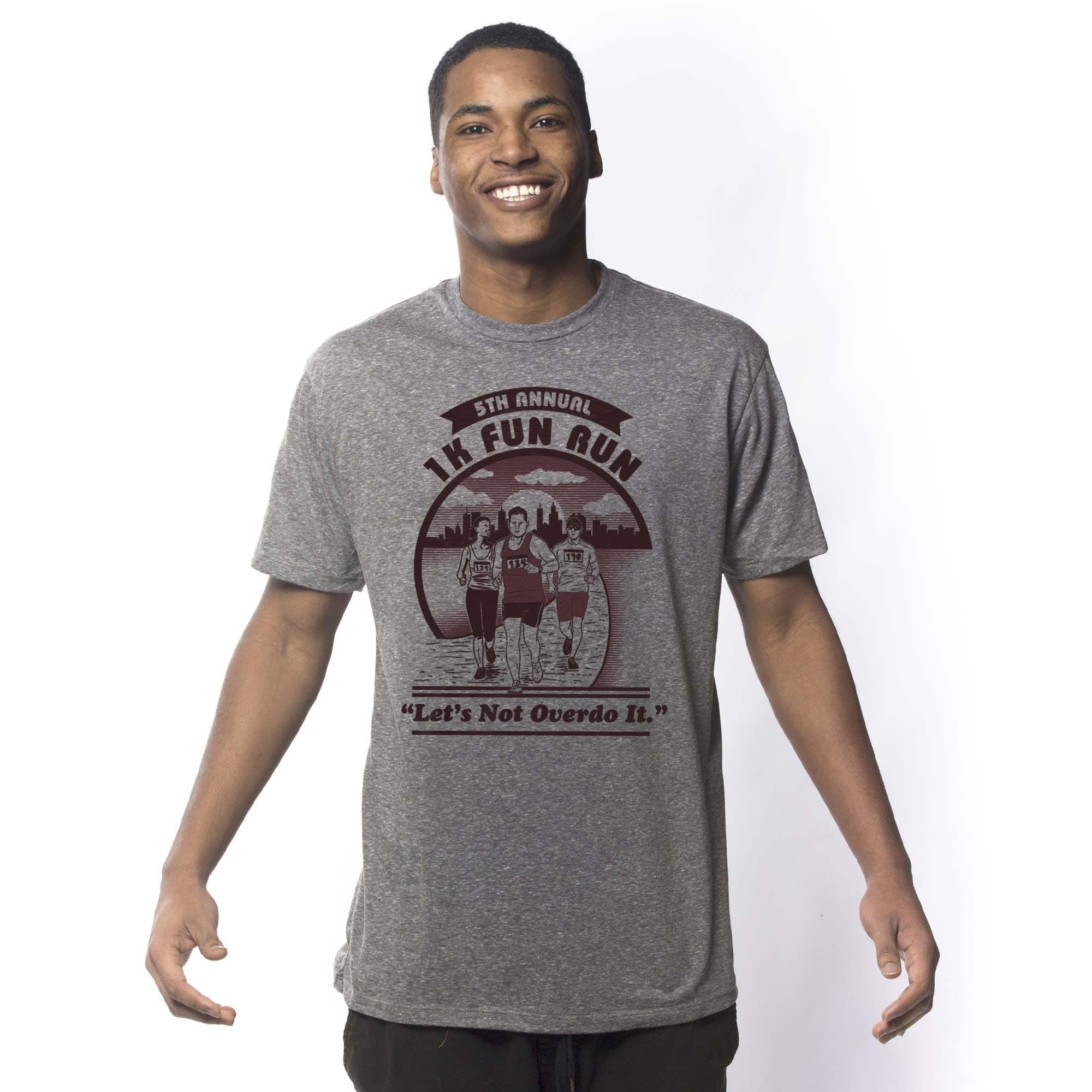 Men's 1K Fun Run Funny Lazy Athlete Graphic T-Shirt | Vintage Parody Tee on Model | Solid Threads