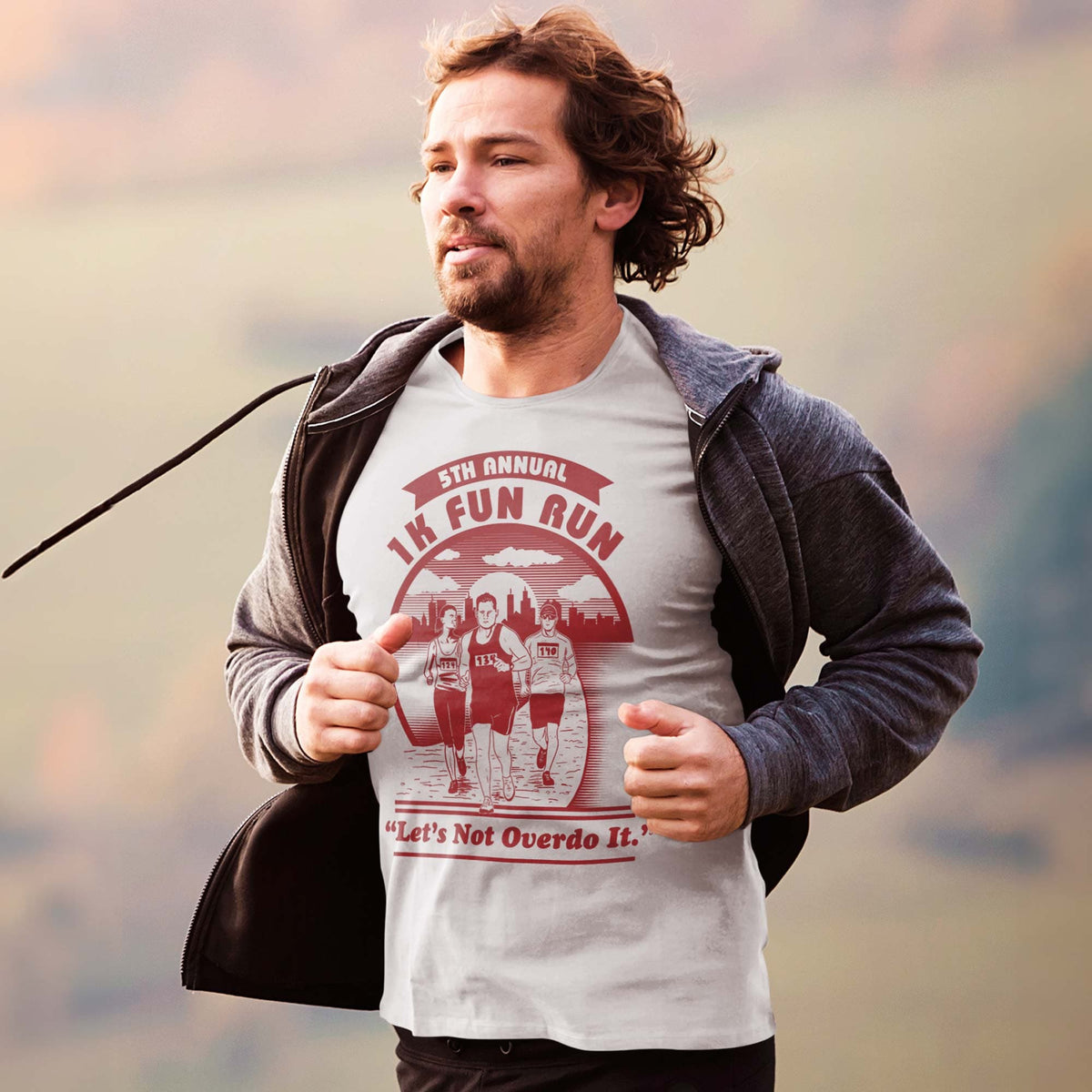 Men's 1K Fun Run Funny Lazy Athlete Graphic T-Shirt | Vintage Marathon Parody Tee On Model | Solid Threads