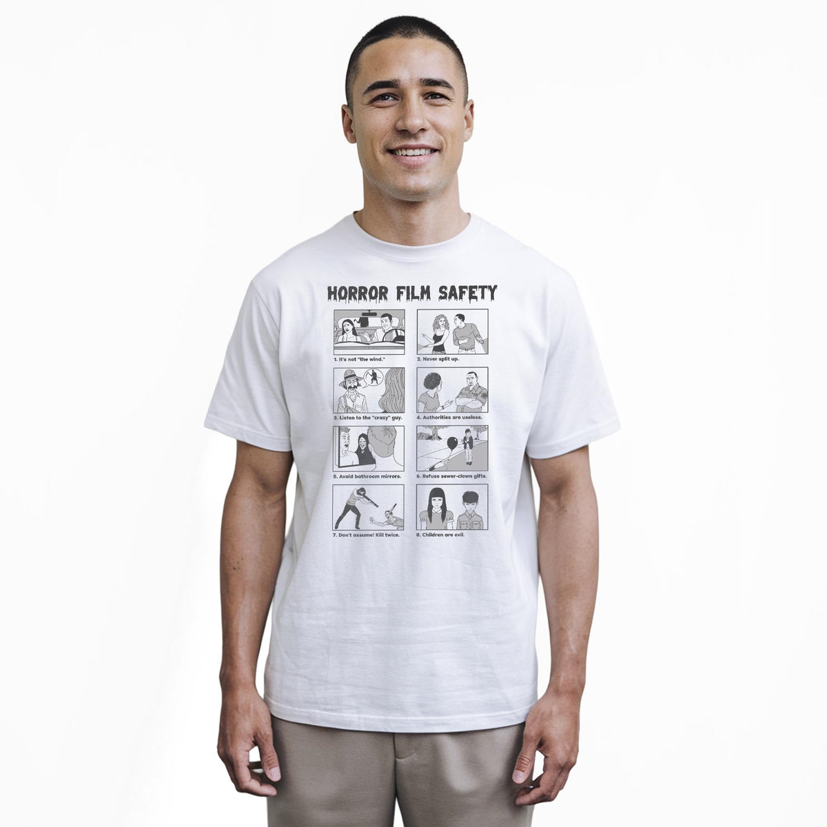 Horror Film Safety Guide Funny Staple T-shirt in White On Model - Front View