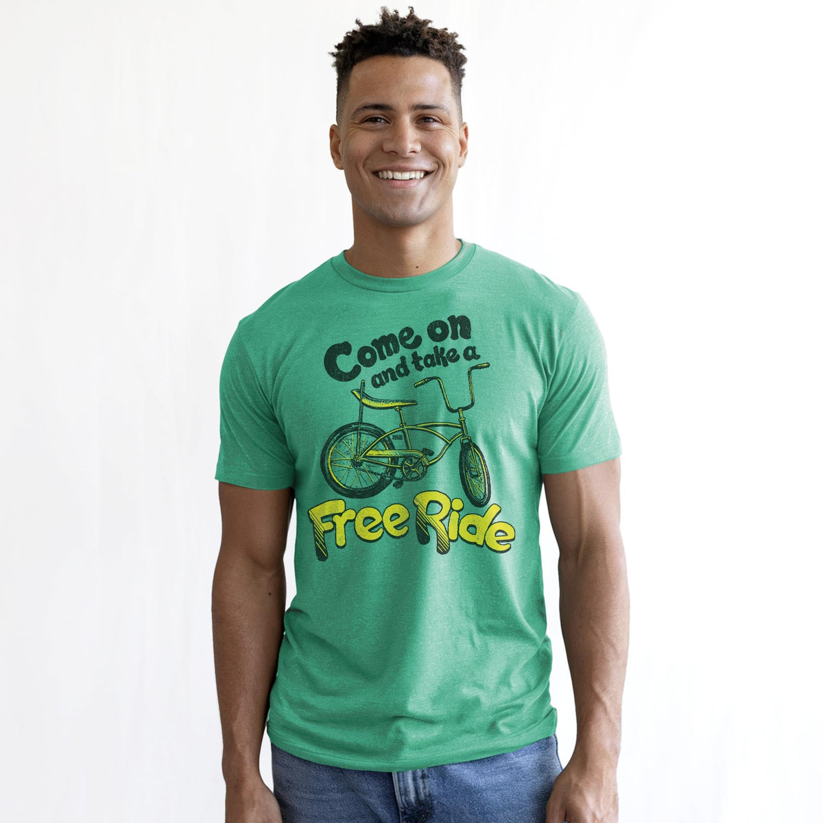 Come On And Take A Free Ride Vintage Staple T-shirt in Kelly Heather On Model - Front View