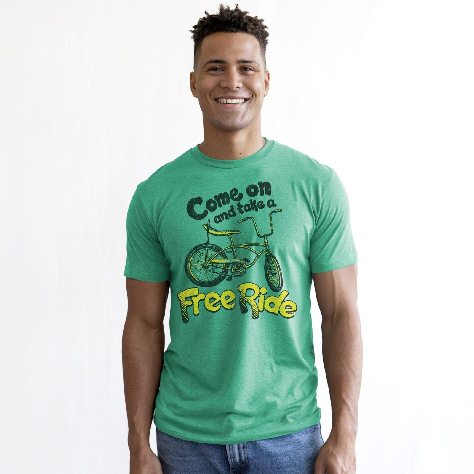 Come On And Take A Free Ride Vintage Staple T-shirt in Kelly Heather On Model - Front View