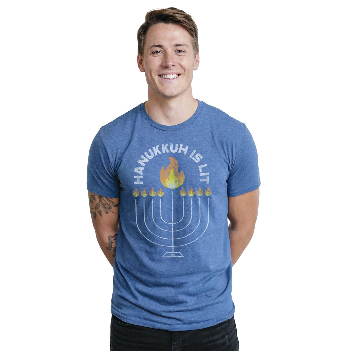 Hanukkah Is Lit Cool Staple T-shirt in Royal Heather On Model - Front View